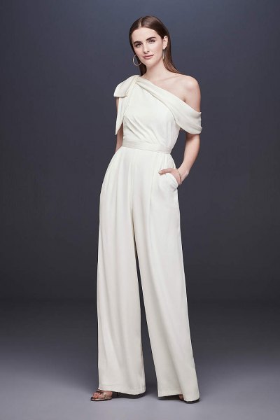 white formal jumpsuit with a shoulder and relaxed fit