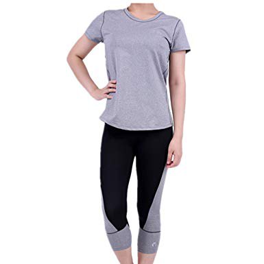 gray t-shirt with black leggings and white sneakers