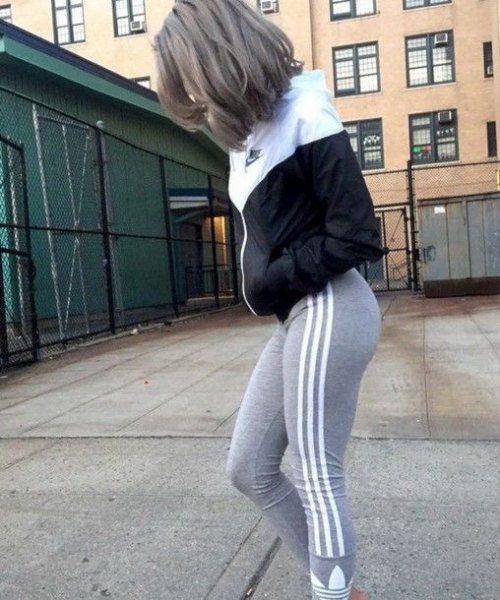 Black and white color block windbreaker with gray running pants