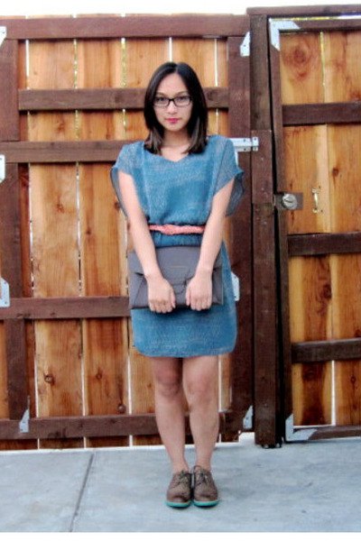blue denim mini dress with scoop neck and wingtip shoes made of brown leather