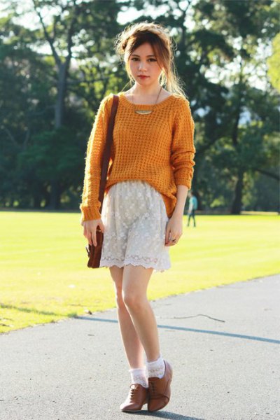 green rib knit sweater with white lace shorts