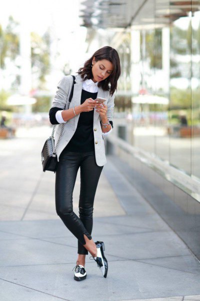 light gray blazer with dark blue skinny jeans and white buck shoes