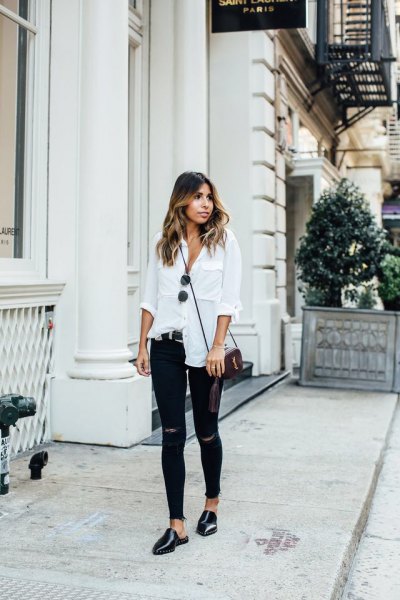 white linen shirt with buttons, torn skinny jeans and black leather shoes