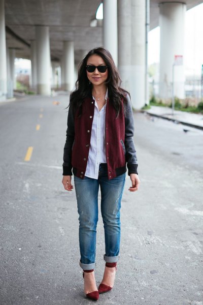black leather jacket with buttoned shirt and burgundy shoes with pointed toes