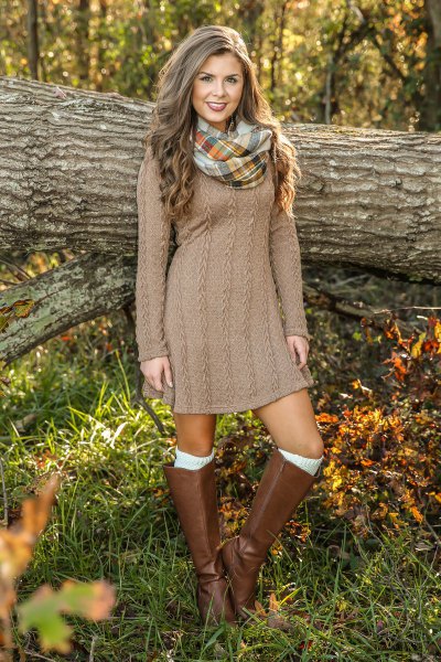 brown cable pattern mini dress with knee-high leather boots