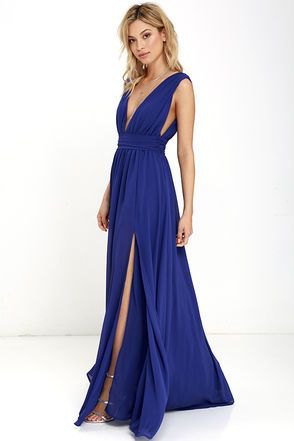 sleeveless, deeply slit dress with deep V-neck and flared dress