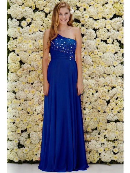 royal blue formal dress with one shoulder and white heels with open toes