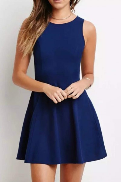 sleeveless dark blue mini cocktail dress with fit and flap