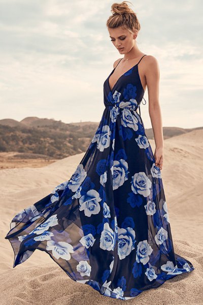 Dark blue, deep, flowing summer dress with a deep V-neck and floral print