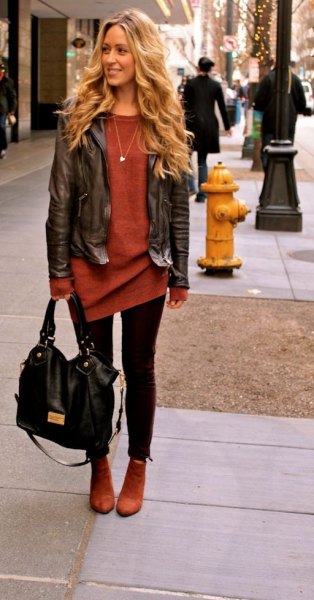 black short leather jacket with red tunic sweater