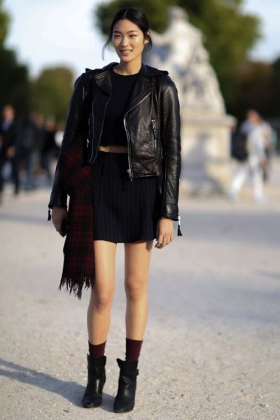 Leather jacket with black t-shirt and mini skirt