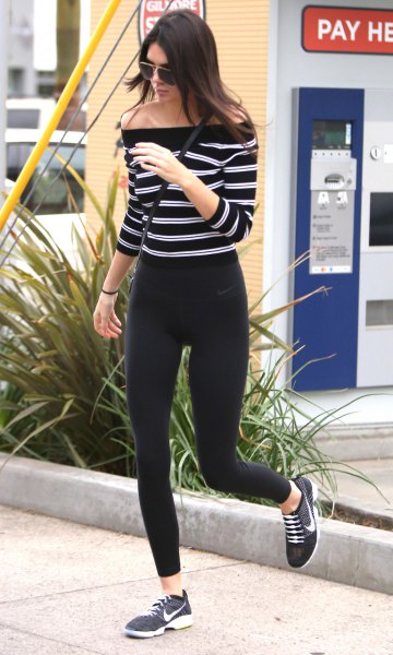 black and white horizontally striped shoulder sweater with windbreaker tights