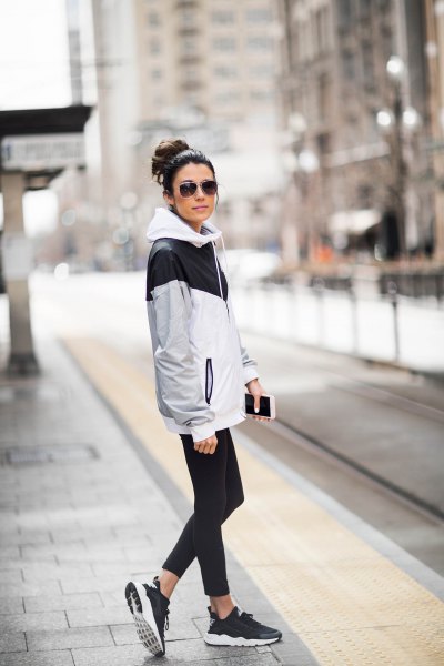 white and gray oversized windbreaker with running pants