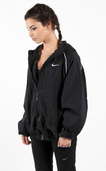 black oversized jacket with slim-fitting running trousers