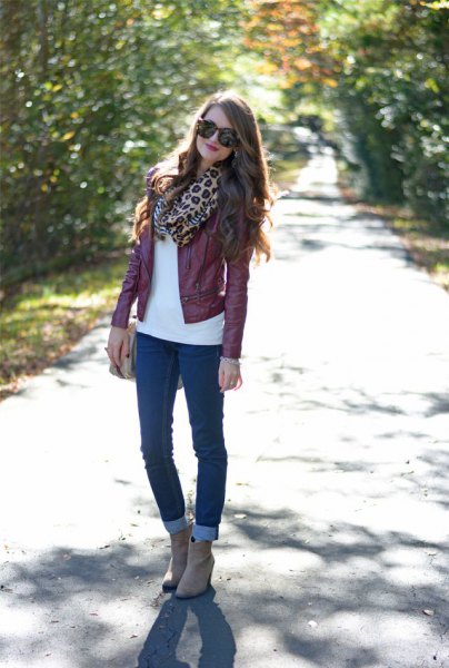 Maroon leather jacket with leopard print scarf and skinny jeans with cuffs