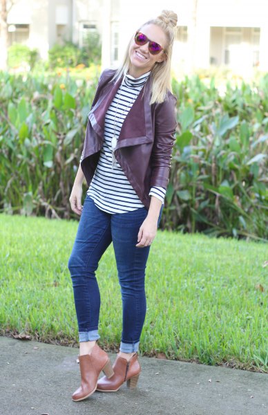 Maroon leather jacket with black and white striped t-shirt with stand-up collar