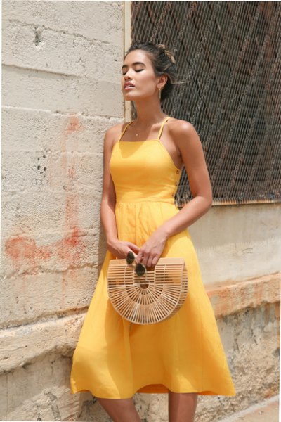 light yellow fit and flared halter chiffon dress