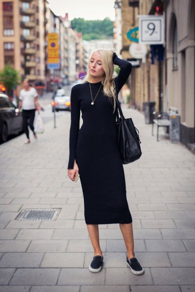 black body-hugging midi dress with canvas sneakers and leather handbag