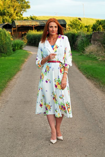 white long-sleeved midi dress with floral print and belt