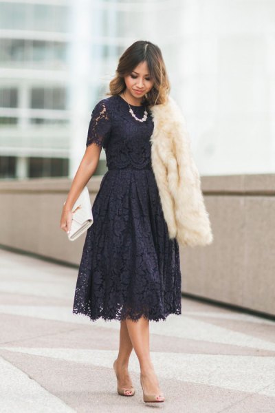 black short-sleeved lace fit and flare midi dress with white faux fur coat