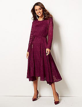 purple long sleeve lace flared dress with black velvet heels