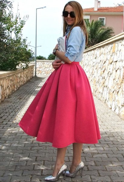 light blue chambray shirt with a pink flared midi dress and silver heels