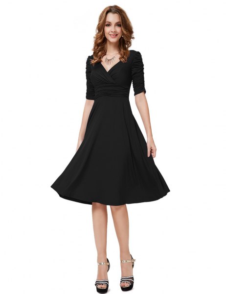 Black, half-sleeved V-neck fit and knee-length cocktail dress with flap