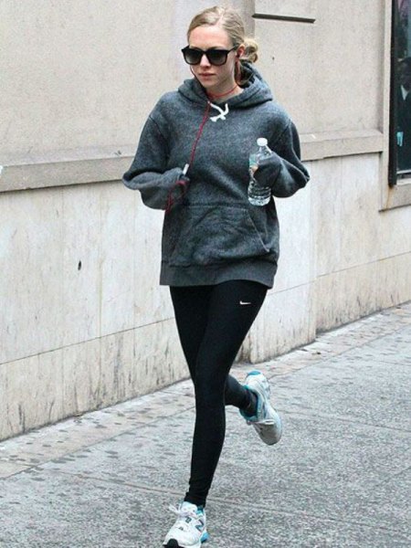 gray hoodie with a relaxed fit and black running gaiters