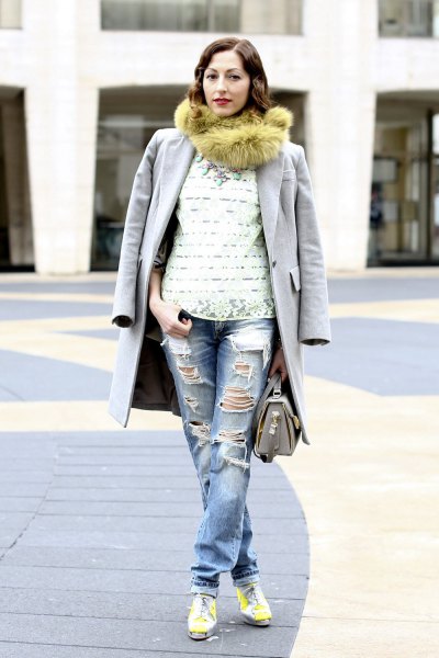 green faux fur scarf with long gray coat and boyfriend jeans