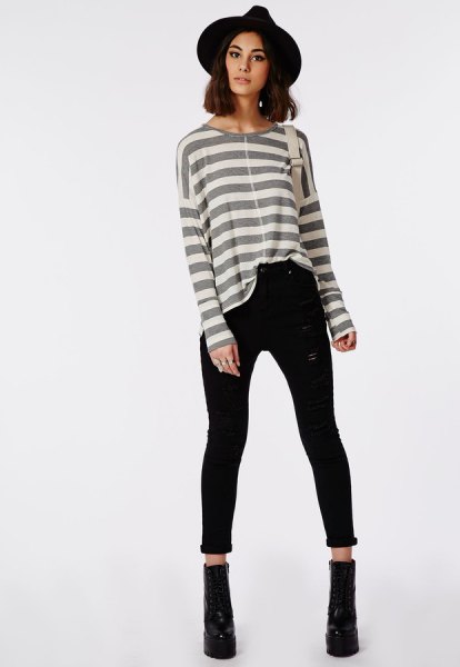 gray and white striped long-sleeved T-shirt with high waisted black skinny jeans with cuffs