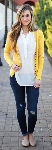 light yellow cardigan with white, semi-transparent polo shirt