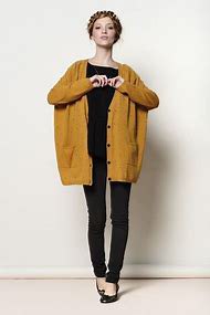 dark mustard yellow, chunky knit sweater with black t-shirt