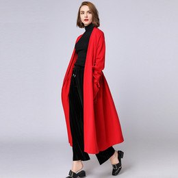 Maxi long red cardigan with black trousers with wide legs