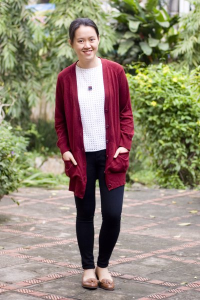 red longline cardigan sweater with white and black polka dot top