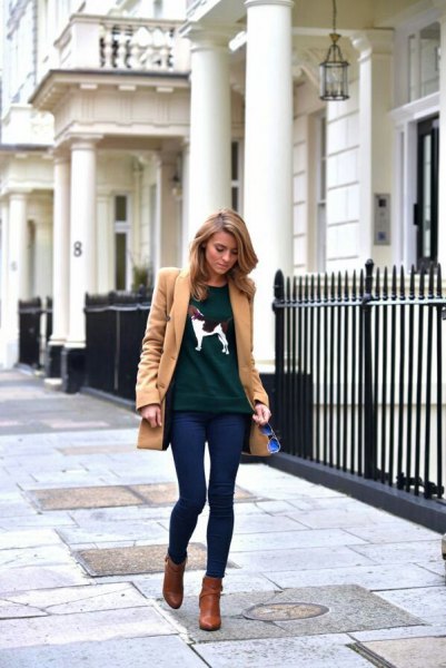 Long camel wool coat with dark blue skinny jeans and brown leather boots