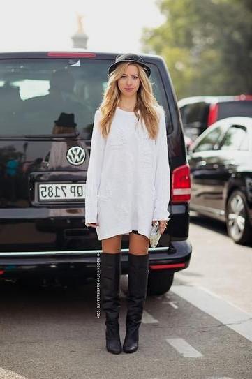Sweater dress with black, thigh-high leather boots