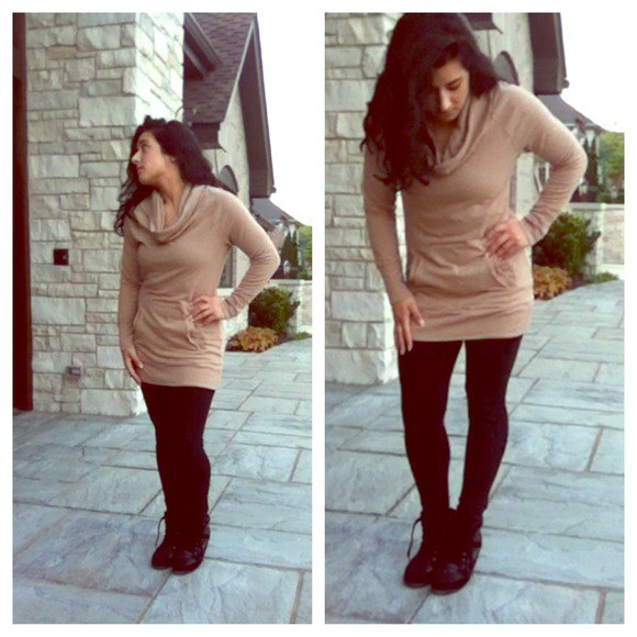 Light brown tunic sweater with a waterfall neckline and black leggings