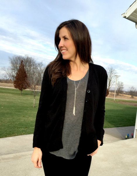 black cardigan with gray scoop neck and boho style necklace