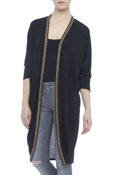 black longline cardigan with a scoop t-shirt and gray jeans