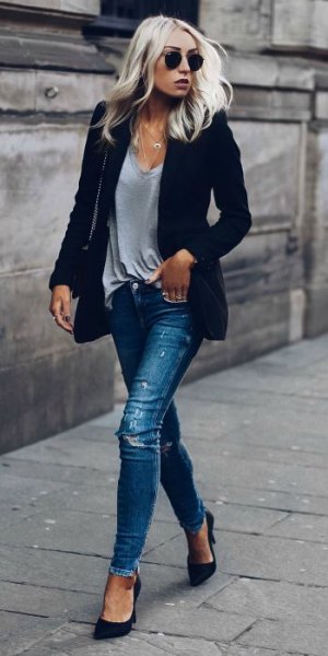 dark blue blazer with gray v-neck t-shirt and torn jeans