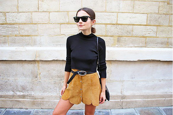 black sweater with scalloped suede mini skirt