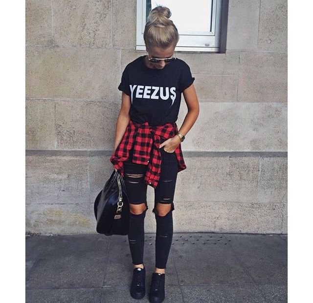 black graphic t-shirt with destroyed jeans and red flannel shirt