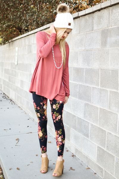 Blush pink t-shirt with patterned floral leggings and open toe boots