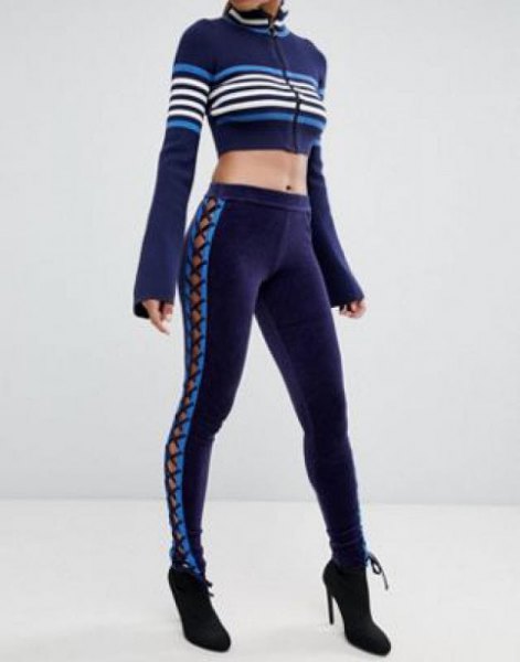 Dark blue running gaiters with matching, short-cut sweater with zipper
