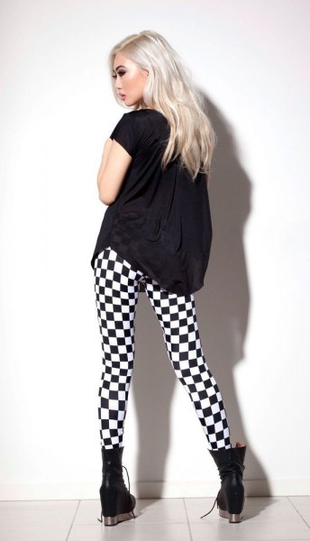 black t-shirt with checkered leggings and ankle boots