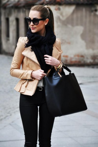 pink leather jacket with a slim fit, black scarf and white blouse