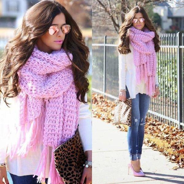 white blouse with light pink knitted scarf with fringes and blue jeans with cuff