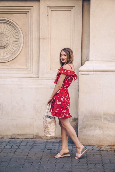 Off shoulder, red mini dress with floral pattern and metallic slippers