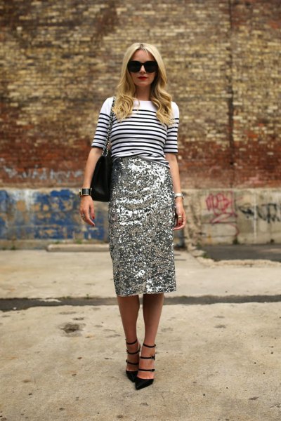 white-black striped knit sweater with gold midi sequin skirt