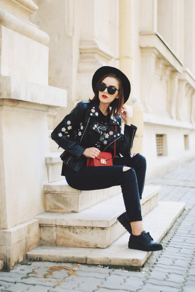 black leather hat with embroidered biker jacket and skinny jeans